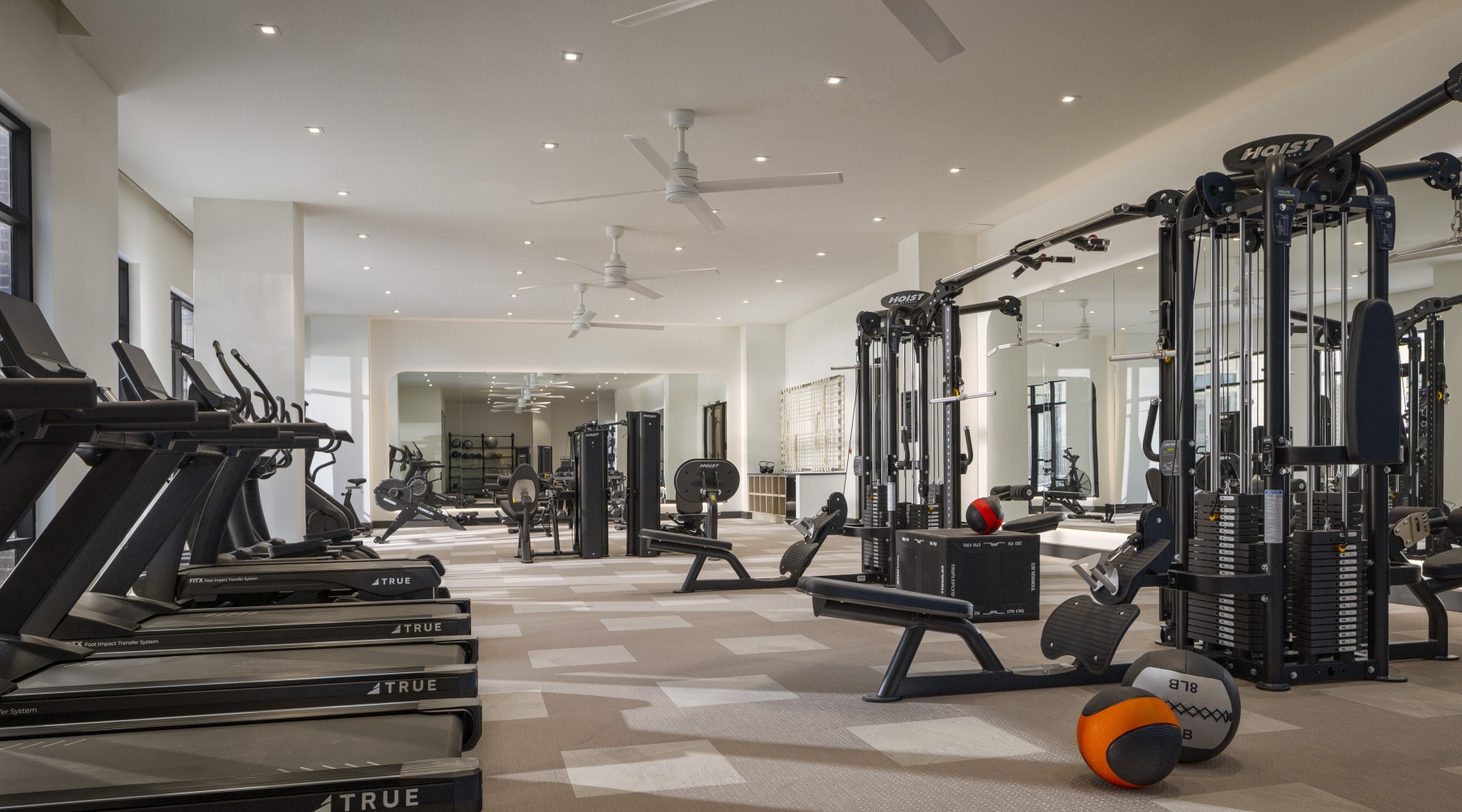 Fitness Center with treadmills, ellipticals, weight machines
